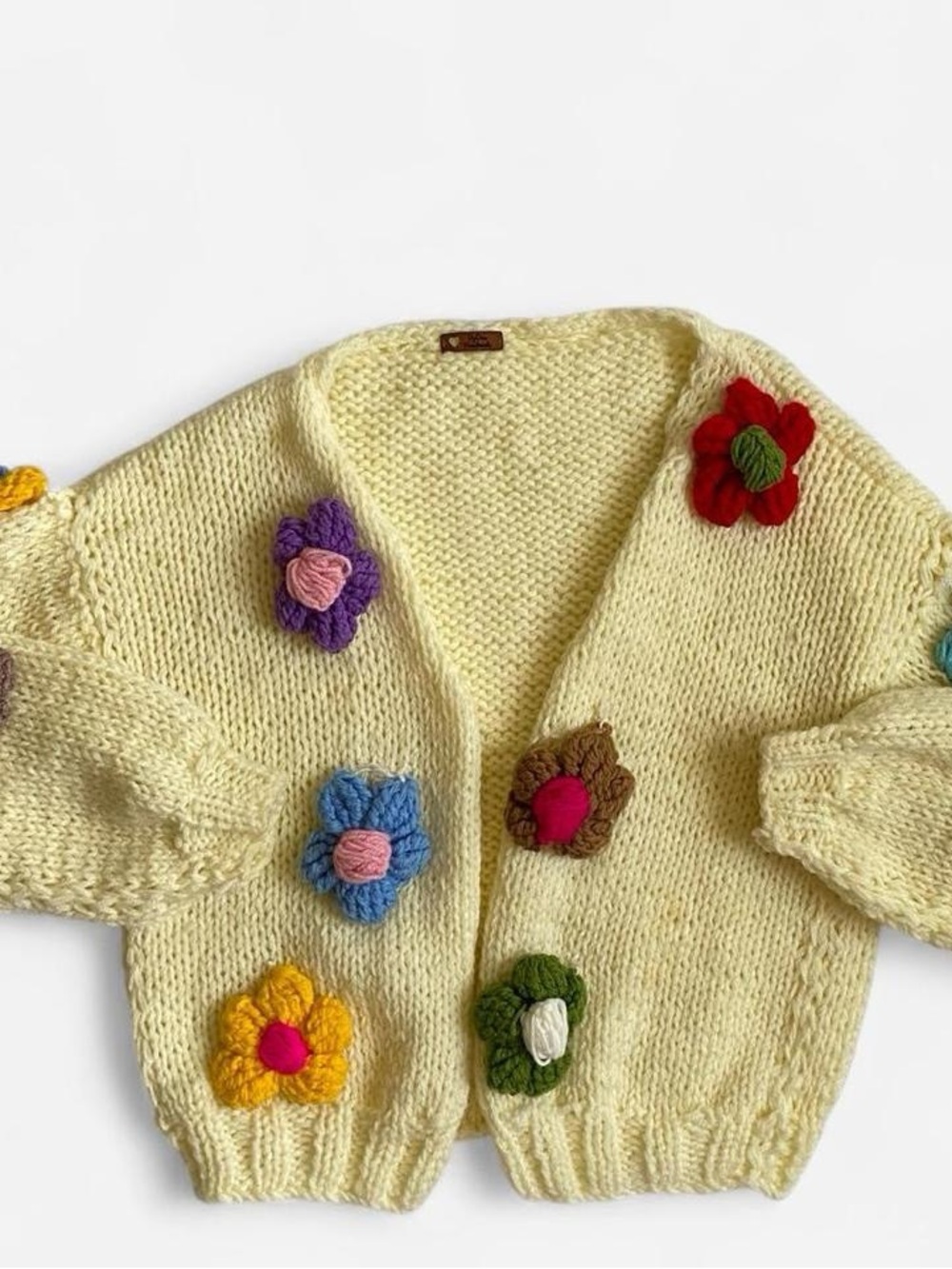 Handmade chunky floral 3-D knit slouchy cardigan